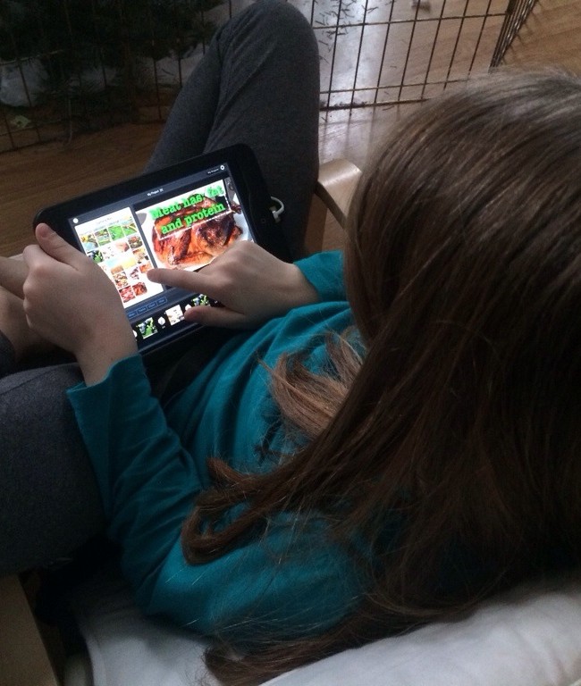 Medea Works on her Slideshow for school